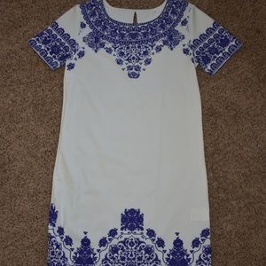 White dress with purple design